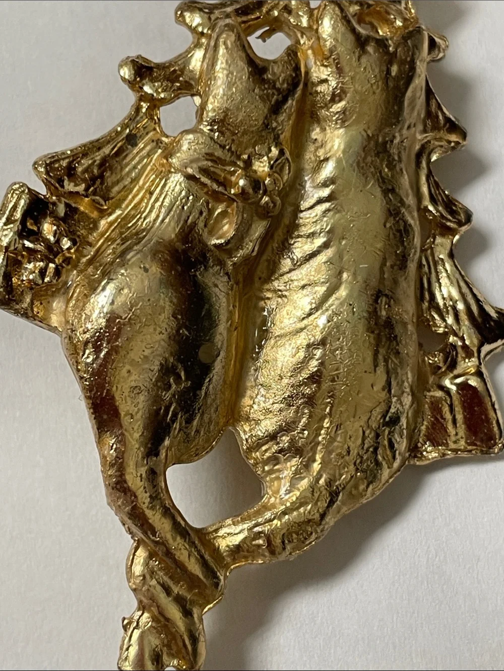 unmarked gold tone